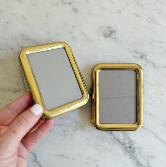 A Pair Of Small Brass Picture Frames (sold together)