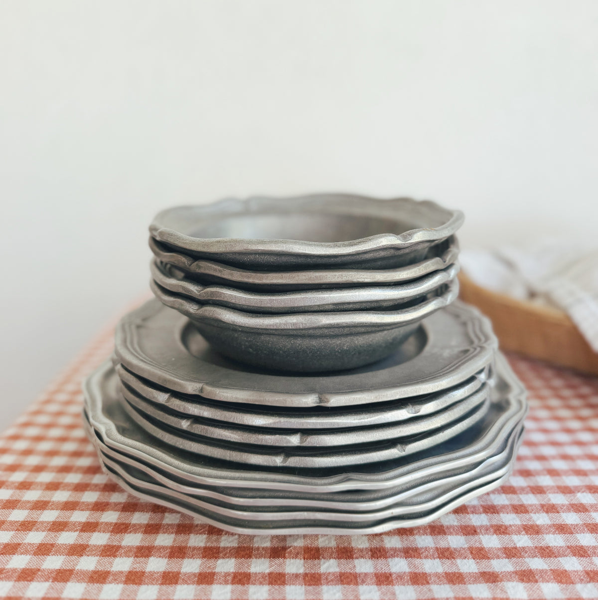 Set of 12 Pewter Wilton Dishes