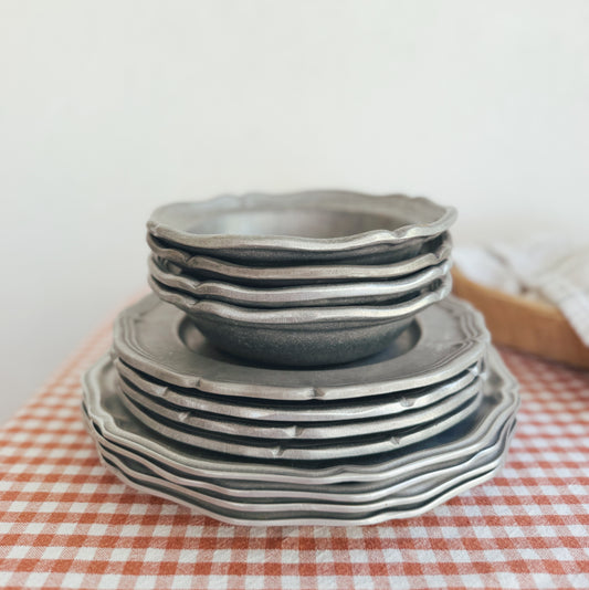Set of 12 Pewter Wilton Dishes