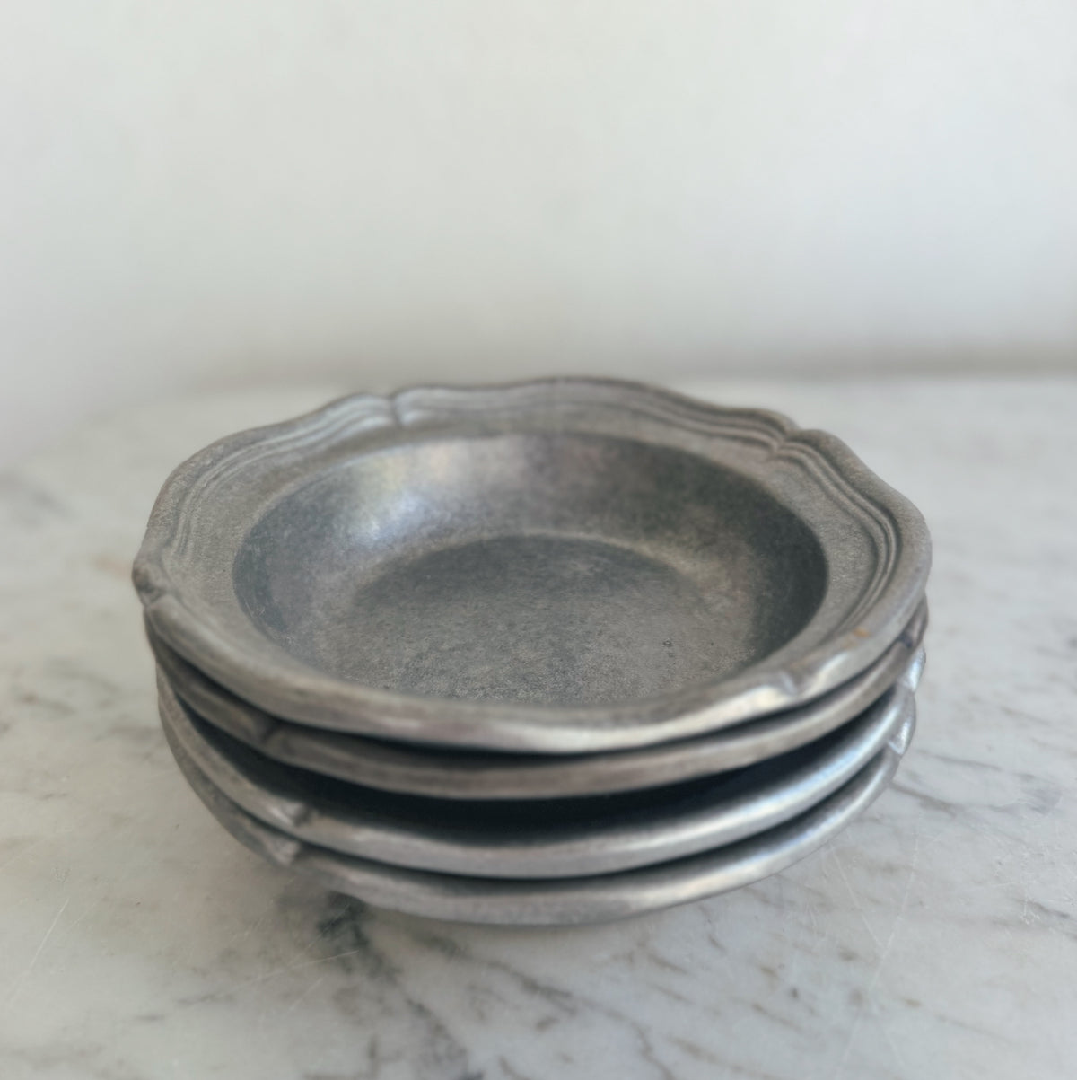 Set of 12 Pewter Wilton Dishes