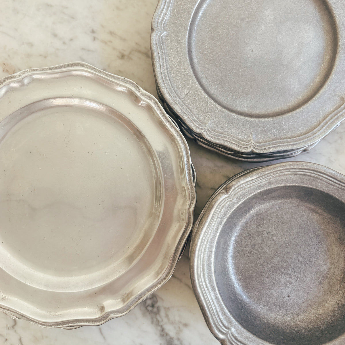 Set of 12 Pewter Wilton Dishes