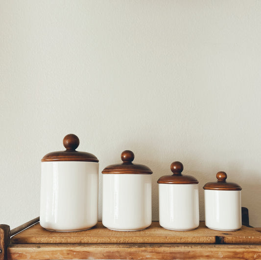 Set of Four Vintage Wooden Lidded Canisters